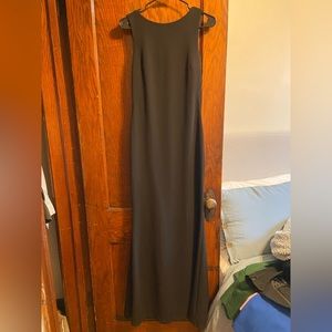 Long black formal dress with back detail.
